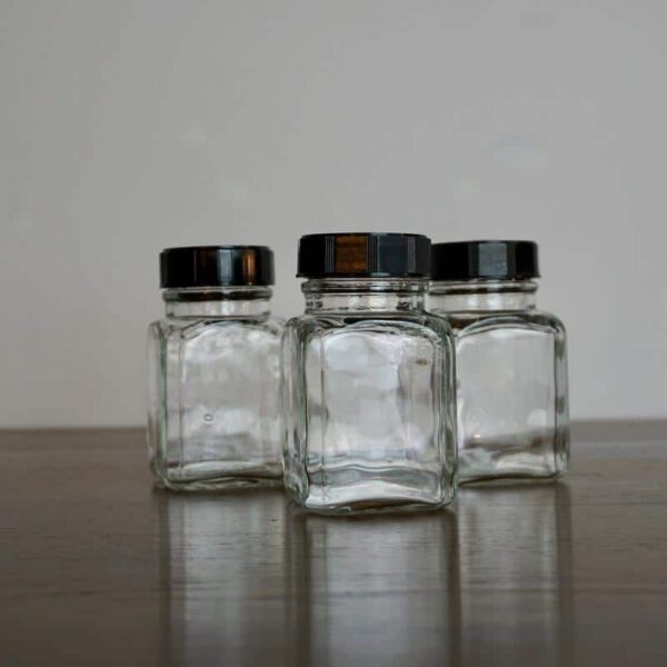 old laboratory bottle with bakelite cap