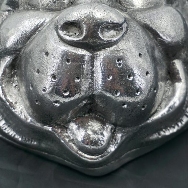 Cast aluminum dog mask detail