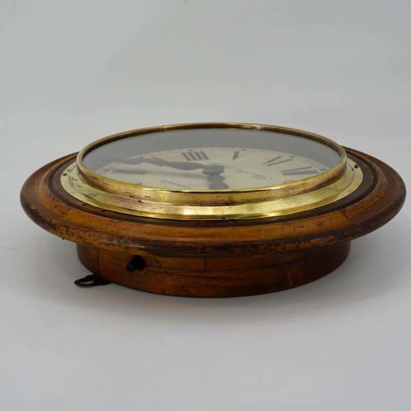 Horloge en bois et laiton