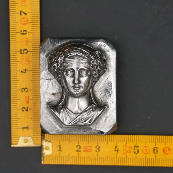 Hardened steel punch, portrait of a woman circa 1880