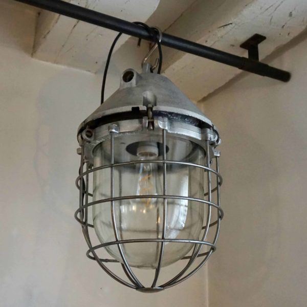 cast aluminum lamp with glass and grille