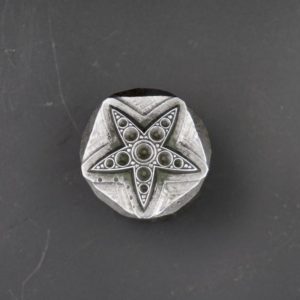 Poinçon de bijoux ancien en forme d'étoile
