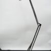 Articulated and adjustable industrial desk lamp