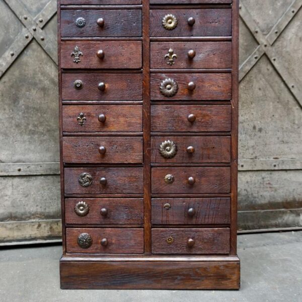 Old wooden storage unit with drawers