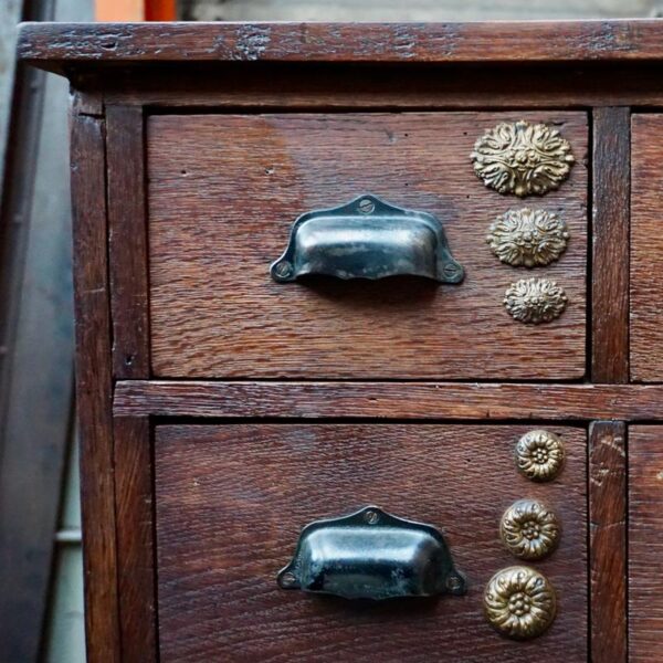 Antique storage unit with lots of drawers