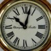 Horloge en bois et laiton ancienne