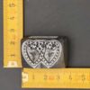 Antique double heart brooch