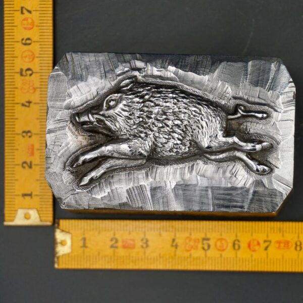 Boar engraved in steel by hand