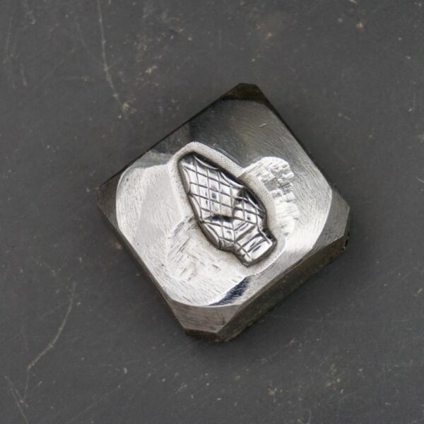 Jewelry die with snake head, 1930