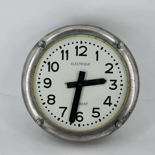 Horloge électrique vintage en fonte d'alu