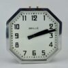 Horloge électrique brille année 50 octogonale