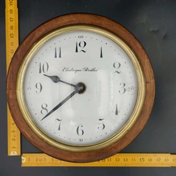 Small industrial electric clock in wood and brass