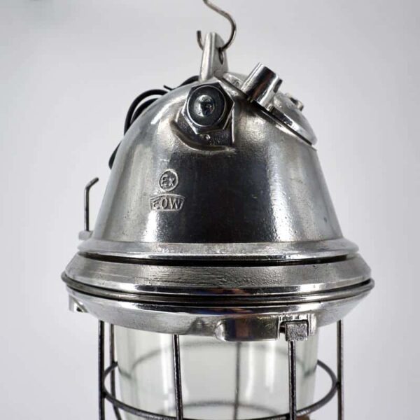 Lamp in cast aluminium with grid and glass