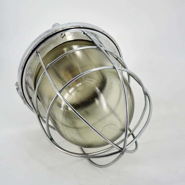Antique industrial lamp with glass and grille