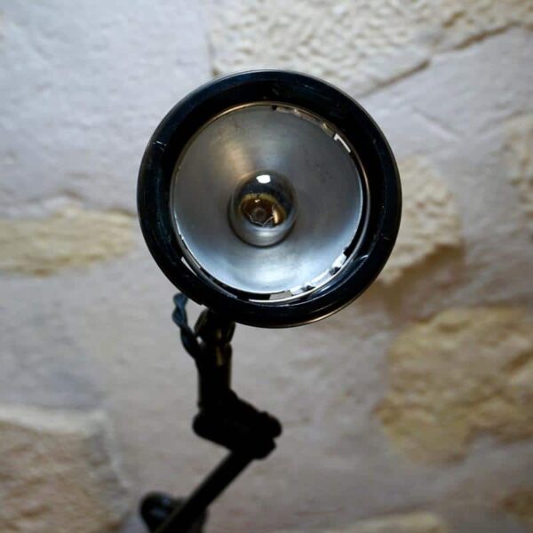 Small black desk lamp with bakelite shade by Singer