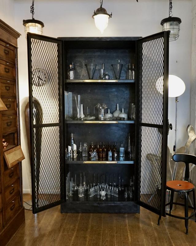 old industrial cabinet with mesh doors