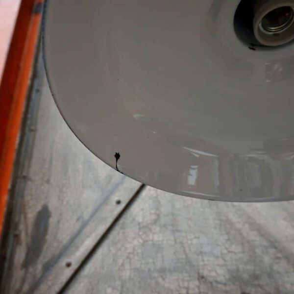 Industrial floor lamp with casters and enameled sheet metal globe
