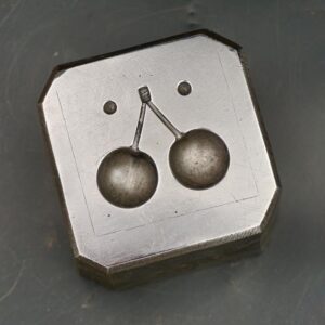Steel paperweight