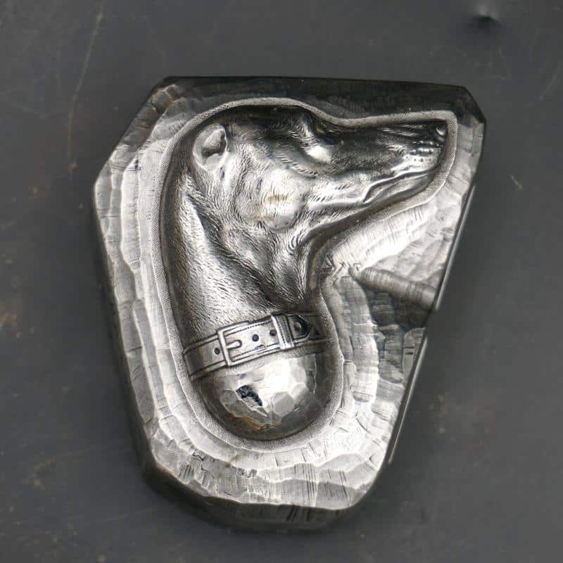 Engraved greyhound head