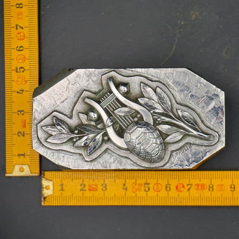 Die with a lyre and a turtle shell