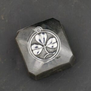 Médaille de trèfle a 3 feuilles