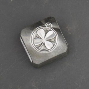 Four-leaf clover charm